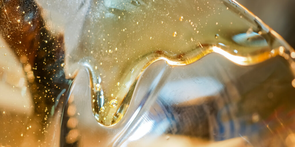 A closeup of The Clear’s cannabis distillate. This cannabis distillate is used in The Clear products such as distillate gummies.