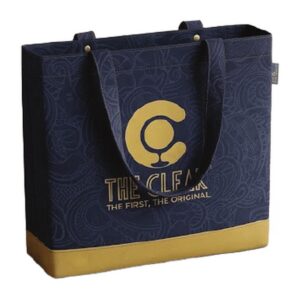 The Clear navy tote bag with gold logo